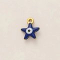Macro detail of star-shaped pendant with blue enamel and central evil eye charm - Blue Evil Eye Star Pendant