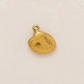 Detailed view of a gold shell pendant with textured finish and an integrated hanging loop - Metal Shell Pendant