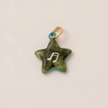 Detailed view of star-shaped copper gold plated charm with musical note and green texture - Green Star Musical Note Pendant
