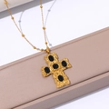 Detail of 18k gold plated cross necklace with black stones and hammered texture - Lava Texture Black Stone Cross Style (JJN0294)