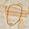 Gold Cuban chain necklace with zircon-encrusted spiral pendant on beige silk - Circle Pendant