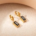 Detail of titanium steel earrings with golden hoops and black rectangular pendants - Black Zirconia Rectangle Earrings
