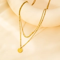 Double-layered gold titanium necklace with beaded chain and vintage coin pendant - Gold Coin Portrait Necklace