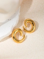 Detailed view of gold spiral C-shaped earrings on elegant silk background fabric - C-Shaped E0346 Style