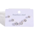 Trois paires de puces d'oreilles en acier inoxydable doré avec zircons de tailles variées - Or Rond Strass