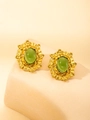 Detail of vintage gold earrings featuring green oval stones and baroque relief pattern - French Vintage Scroll Pattern Style (5813010231090) / Green Stud Earrings