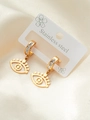 Detailed view of gold stainless steel evil eye earrings with white zircon on silk - Pave Zircon Eye