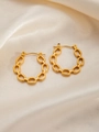 Detail of gold-plated chain link hoop earrings on a soft cream satin background - U-Shaped E0249 Style