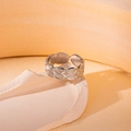 Detailed close-up of a silver-toned open ring with intricate geometric chain pattern - Geometric Hollow Style (40382) / Silver