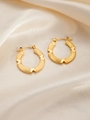 Detailed macro view of triple-layered gold-plated hoop earrings on champagne silk background - Round E0257 Style