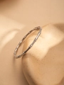 Macro shot of silver bamboo joint bangle made of polished titanium steel for women - Silver Bamboo Joint Style