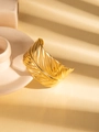 Detail of gold titanium steel open bangle with intricate tropical leaf vein textures - Tropical Feather Texture Style