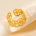 Elegant gold hollow-out titanium steel ring with lace floral patterns in golden finish - Lace Hollow Cross Star (#0227)