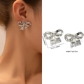 Boucles d'oreilles nœud argenté en acier titane avec finition polie et texture ruban - Nœud 3D Poli (ZJGE0560)
