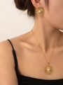 Close-up of elegant gold sunflower necklace and earrings set with white pearls - Jewelry Set (S0074)