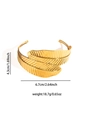 Macro detail of golden leaf-shaped cuff bracelet with fine textures and dimensions - Double Overlapping Feather Style (BJGB0165)