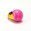 Detail of artistic gold ring featuring marble pattern sphere and unique arched setting - US 8 / Gold Pink Enamel