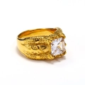 Detail of gold claw ring featuring dragon scale textures and square clear gemstone - US 7 / Gold White
