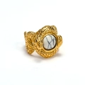 Detail view of gold snake ring featuring textured scales and a white turquoise stone inlay - US 7 / Gold White Turquoise