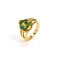 Detail of vintage 18k gold ring with a large round green gemstone and hollow band - Gold Olive Green Zirconia