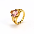 Detail view of pink oval gemstone ring with 18k gold plated split shank setting - Gold Pink Zirconia
