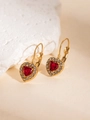 Golden leverback earrings featuring heart-shaped red gems surrounded by fine crystals - Heart Style / Red
