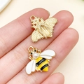 Handheld bumblebee alloy charm with yellow and black enamel and a pearl head detail - Enamel Yellow Pearl Bee (19000) / 19x21mm