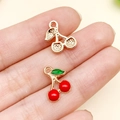 DIY cherry fruit alloy pendants in hollow gold and red enamel finish for jewelry making - Mini Cherry Pendant