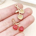 Pendentifs cerise en cristal rouge et finition dorée pour colliers ou bracelets - Cerise Strass Rouge Or KC (23422) / 23x12x3mm