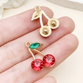 Pendentifs cerise en gemme rouge et dorée pour colliers et bracelets faits main - Cerise Strass Rouge Vert Or KC (23420) / 19x14x5mm