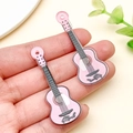 DIY craft accessories featuring two pink acrylic retro printed electric guitar pendants - Purple Printed Guitar (24041)