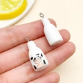 DIY resin milk bottle pendant charms for jewelry making held by hand to show size - White Simulation Milk Bottle