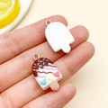 Cute resin ice cream pendant for DIY keychains featuring chocolate glaze and colorful hearts - White Heart Popsicle