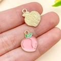 Mini pendentif pêche en alliage émaillé rose avec dos doré pour création de bijoux - Pêche de Miel (Rose)