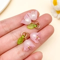 Maiglöckchen Anhänger aus Acryl in Rosa mit grünem Blatt für DIY Schmuckherstellung - 22x20mm / Transparentes Rosa
