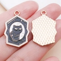 Handheld view of a hexagonal rose gold black cat enamel pendant for DIY jewelry making - Black Enamel Halloween Mirror Looking Black Cat (25013)