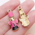 Pink and black lipstick ghost charms with bow and heart details for DIY jewelry - Enamel Magenta Pink Bowknot Lipstick (21339) / 26x11mm