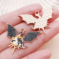 Ciondoli a forma di drago in oro rosa con smalto nero e arancione per creazione di gioielli - Stile Dragone del Sole Giallo in Smalto Nero (25228)
