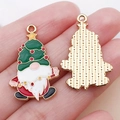 DIY Christmas pendant featuring a cute Santa dwarf with green tree hat and golden star - Green Enamel Christmas Gnome Style (21713)