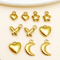 Golden stainless steel charms in heart, star, butterfly, and moon shapes for DIY jewelry - Star Moon Heart Butterfly Pendants Mix (SN1424)