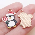 Cartoon Christmas penguin enamel charm with a red hat for DIY jewelry making - White Enamel Christmas Lollipop Penguin Style (25284)