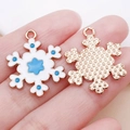 Golden alloy snowflake pendant with white enamel and blue details for DIY jewelry making - White Enamel Christmas Snowflake Style (25286)
