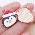 Christmas penguin enamel charm with red hat and golden textured back for DIY jewelry - White Enamel Christmas Hat Penguin Style (25288)