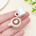 Miniature resin coffee cups set with tiny white hearts and brown latte art detail - White 3D Single Heart Style (23960)