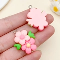 DIY resin flower pendants in pink gradient finish with metal rings and green leaf detail - Pink Resin Two-Tone Five Petal Flower (24333) / 29x23x8mm