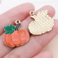 Pendentif citrouille en émail orange avec dos en métal doré pour bijoux DIY - Citrouille aux Feuilles à l'Huile Orange (25061) / 21x20x2mm