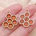 Pair of golden honeycomb pendants with amber resin for DIY jewelry making - Orange-Yellow Double-Sided Bee Honeycomb (13955)