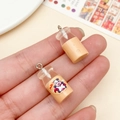 Miniature resin milk bottle pendants with cartoon cow stickers for DIY jewelry making - Transparent Brown Milk Bottle