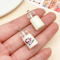 Miniature resin milk bottle charms with cartoon cow stickers and metal hooks for DIY crafts - Transparent White Milk Bottle