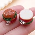 Miniature resin burger charms for DIY jewelry making shown in hand for scale - Light Coffee Color (SN1536)